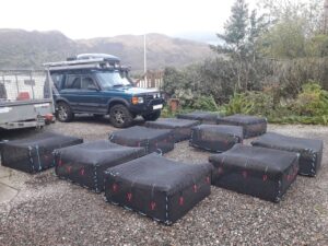 Sea Cucumber cages built from rolls of mesh